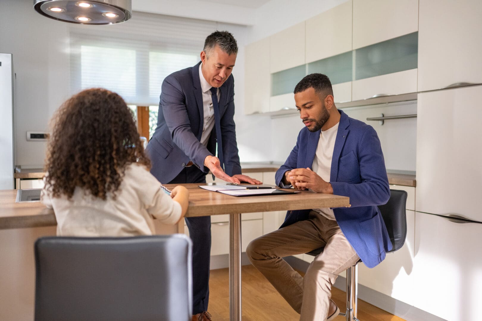 Business meeting in a modern kitchen