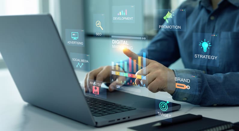 Businessman analyzing digital data charts on laptop screen.