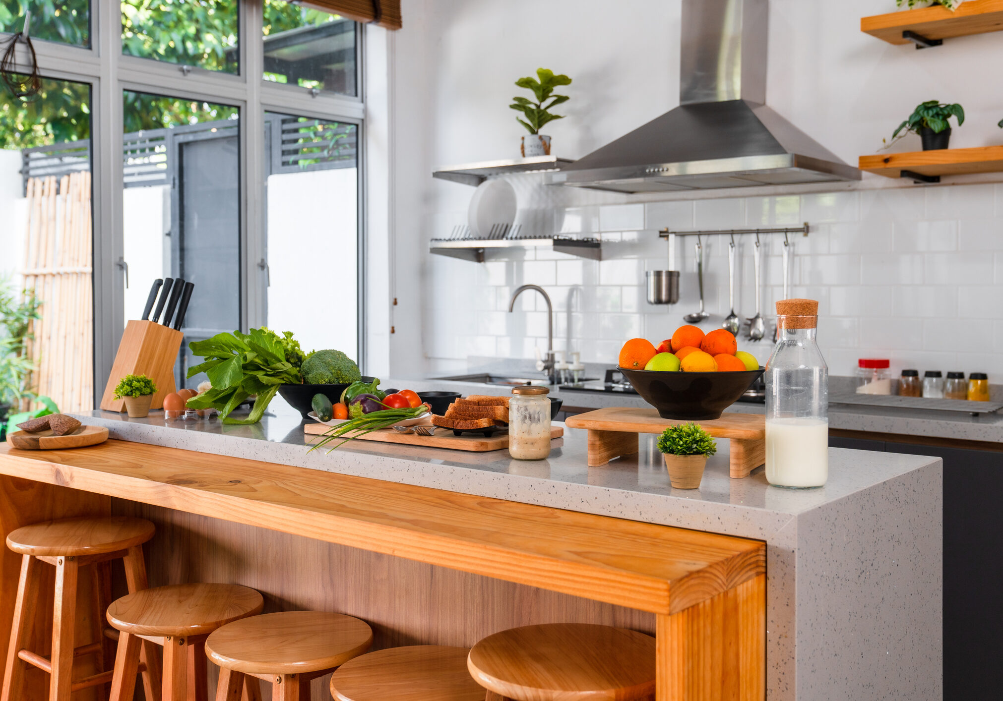 Bright kitchen interior with bar stools