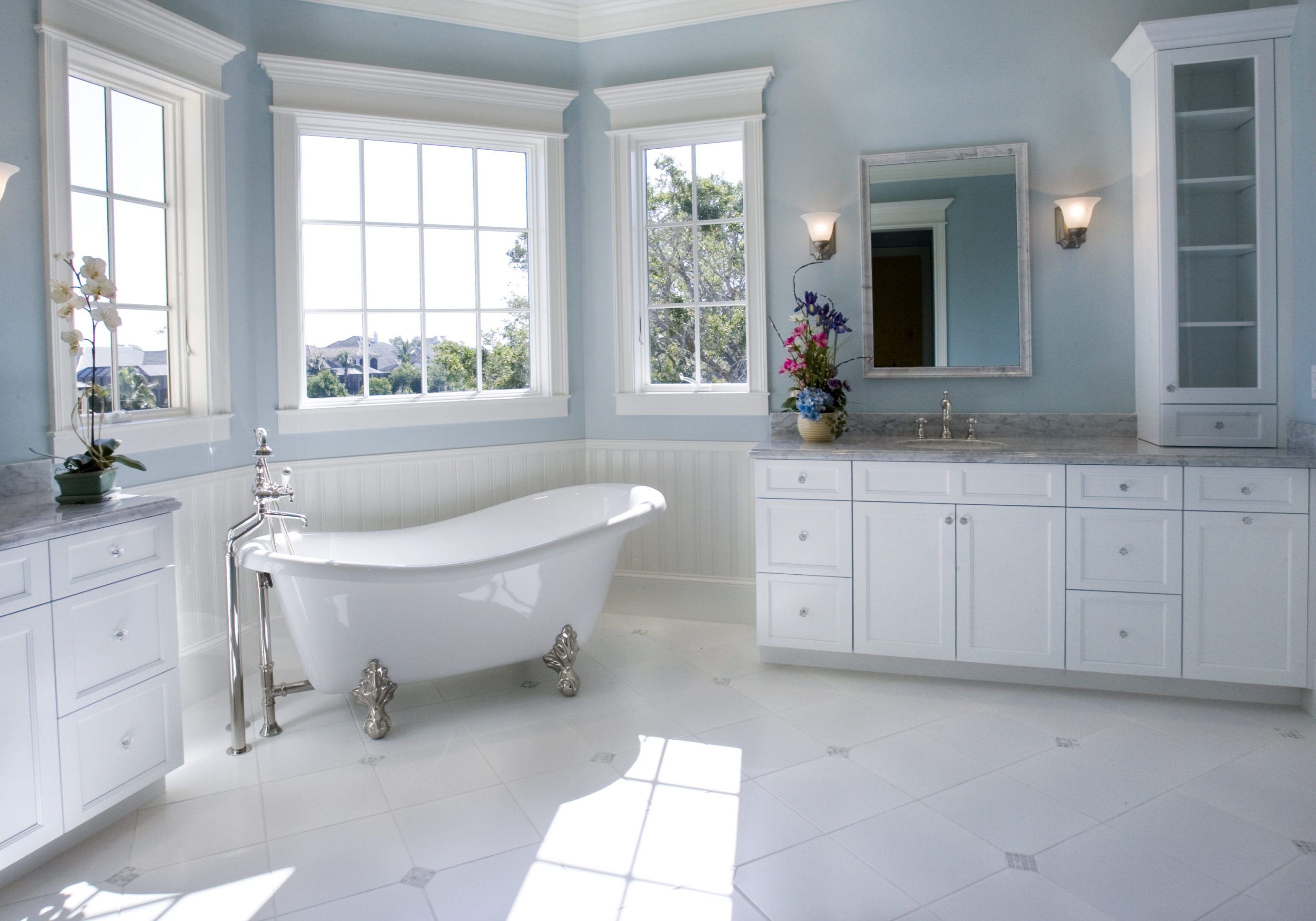 Luxurious bathroom with white cabinetry