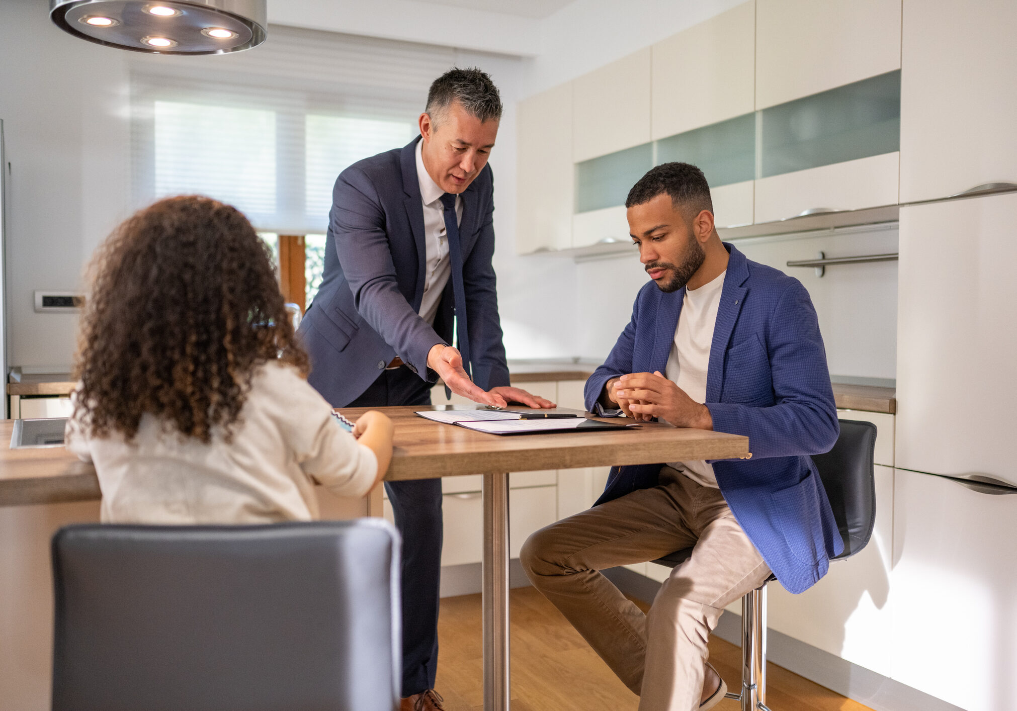 Business meeting in a modern kitchen