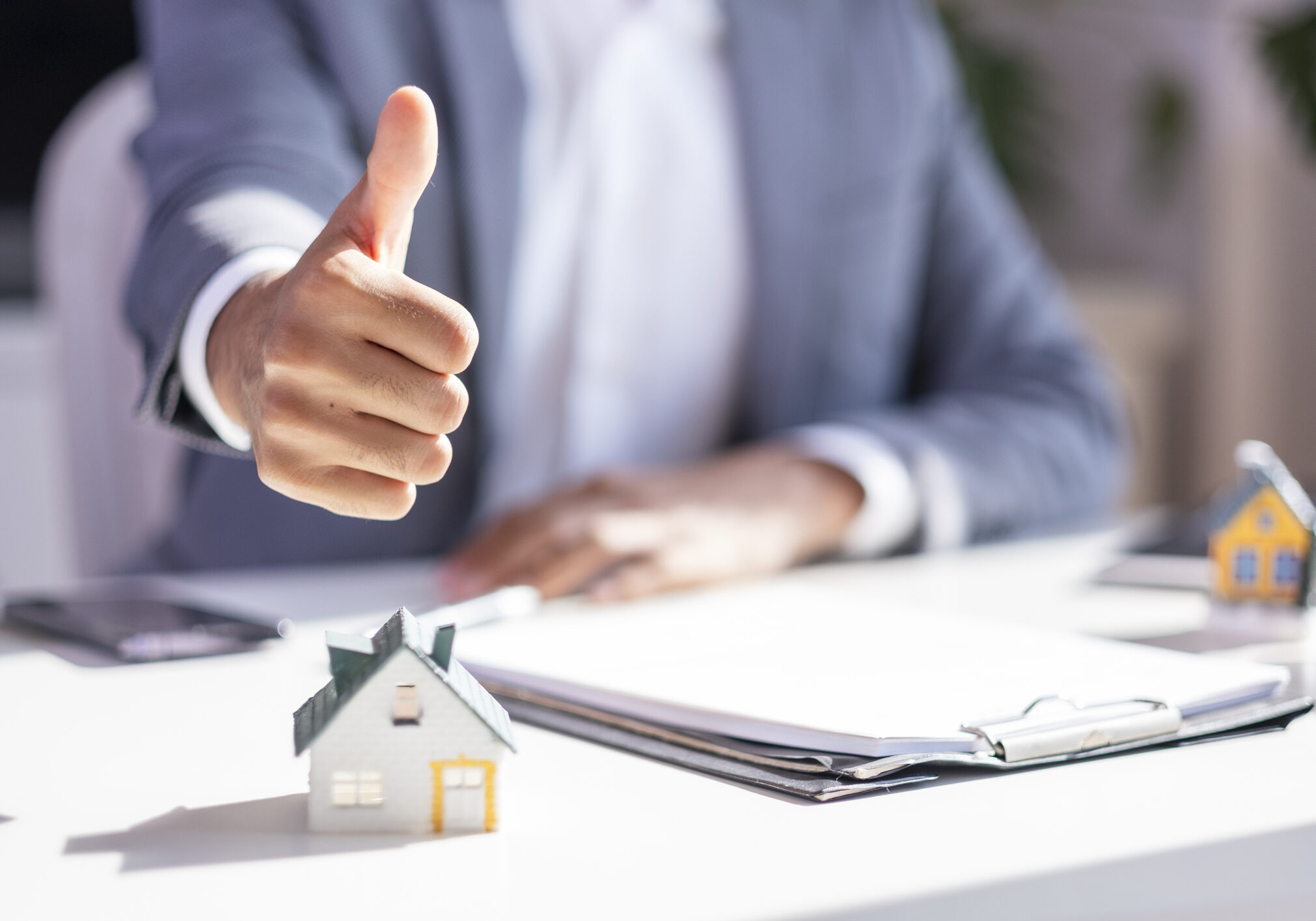 Businessman approving real estate deal