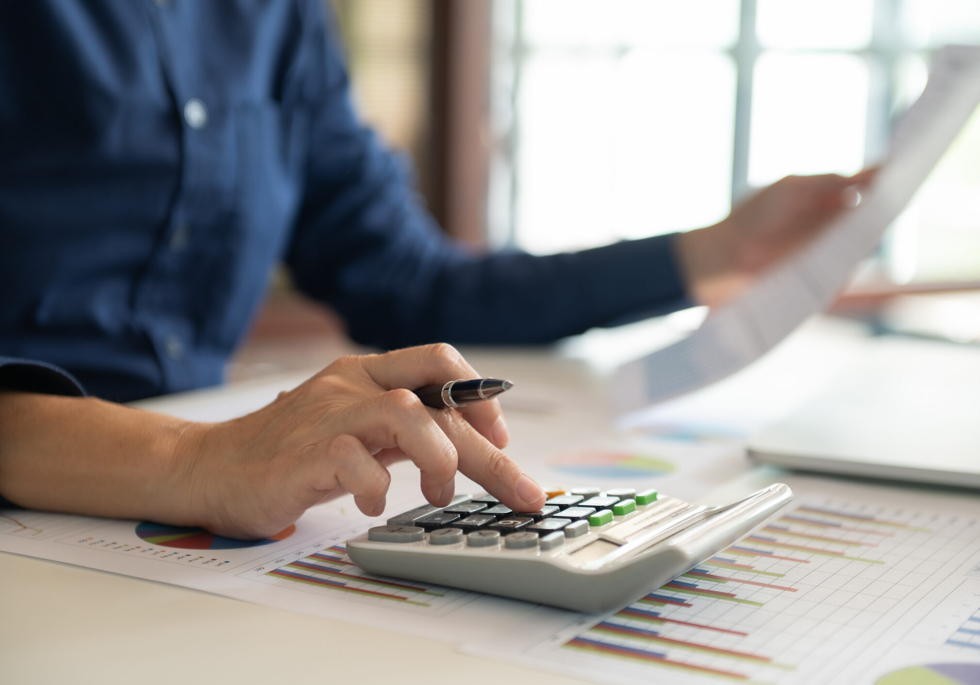 Business professional analyzing financial data